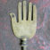 Brass hand in the form of a bird